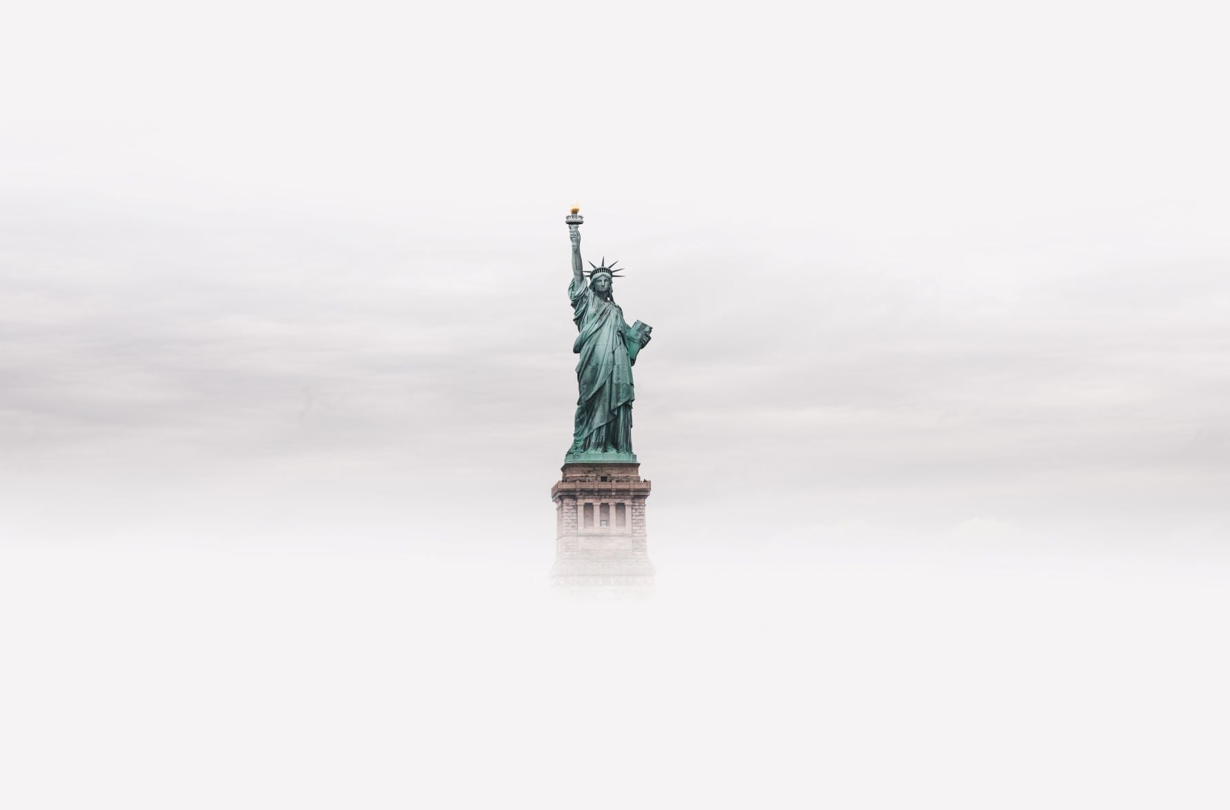 statue of liberty in the fog