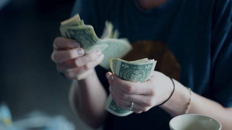 a person holding money
