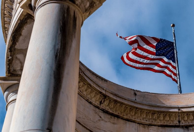 American flag waving in the sky